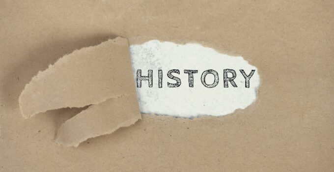 The word History on a ripped paper